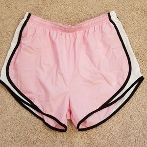 Pink Nike running shorts
